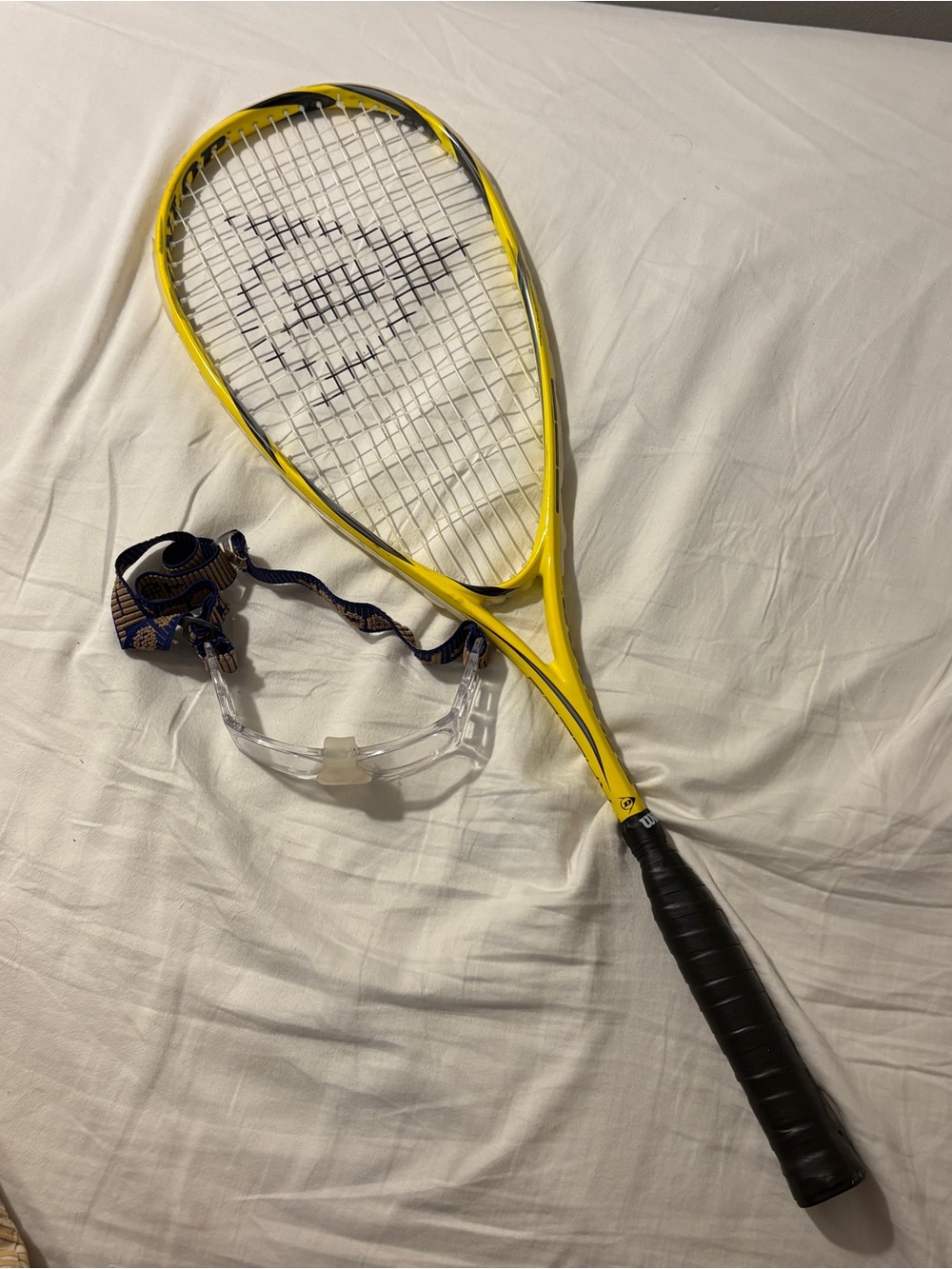 Yellow Dunlop Titanium Alloy Squash Racket with Black Grip and Leader Goggles